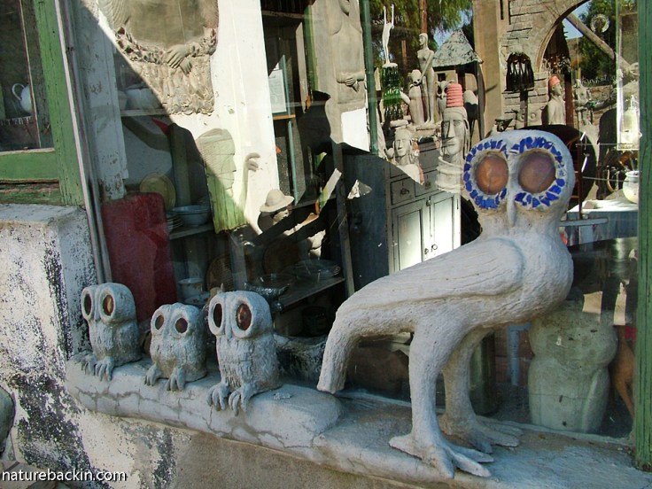 Sculptured owls on window sill at Owl House, Nieu Bethesda, South Africa
