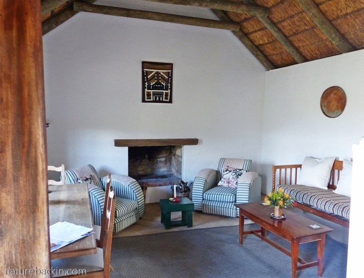 Sitting area in Cape-style cottage accommodation at Wild Rescue Nature Reserve, Western Cape