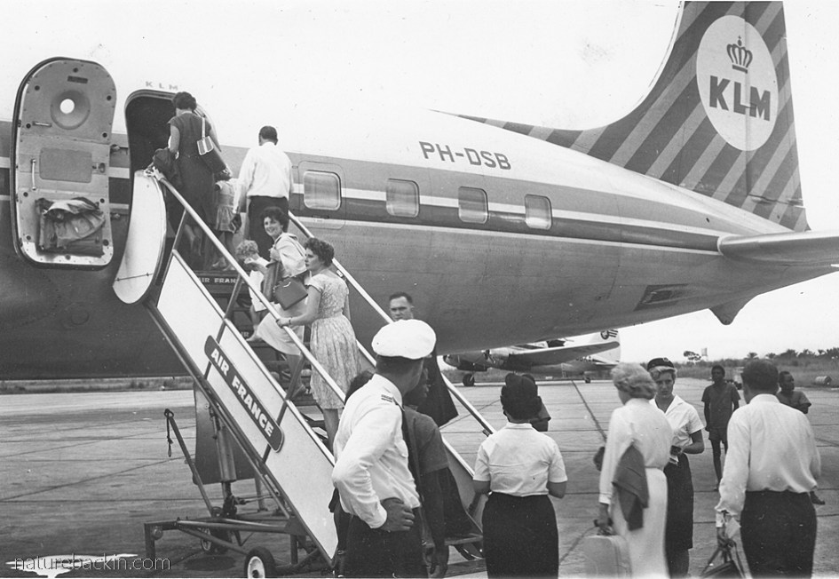 Boarding an airplane, 1960