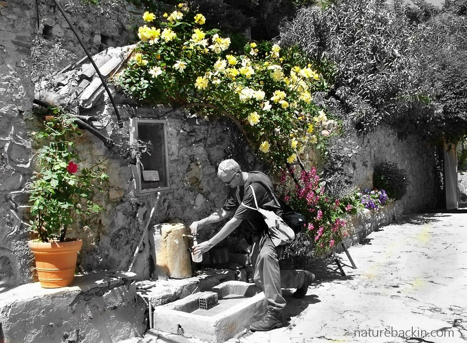Collecting spring water, Mystras, Greece